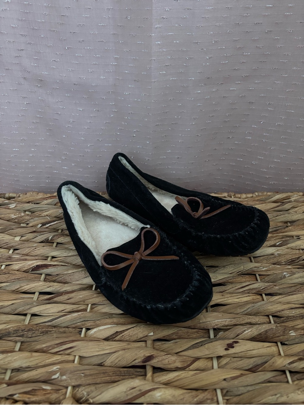 Women’s Black Faux-Fur Lined Moccasin Slippers with Brown Bow
